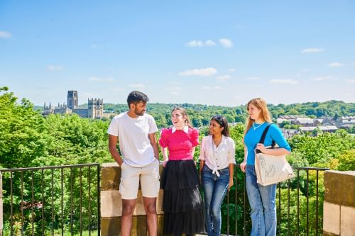Students in park, with Durham Cathedral in the background