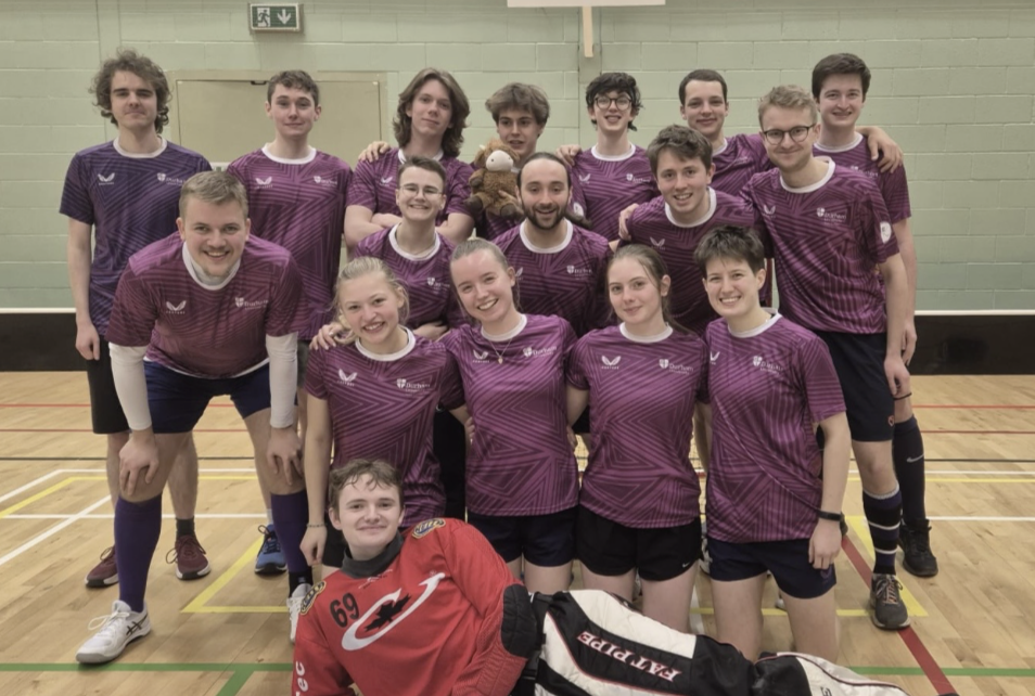 Floorball Team celebrating together