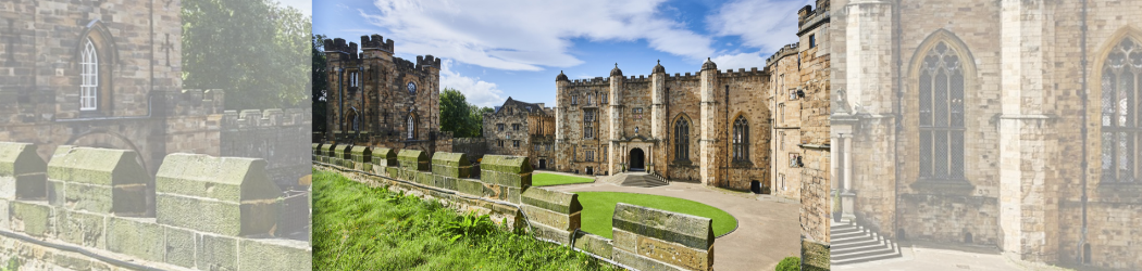 The courtyard of Durham Castle on a bright day with blue sky.