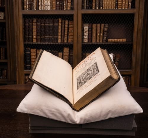Open book sitting on cushion in Cosin's Library