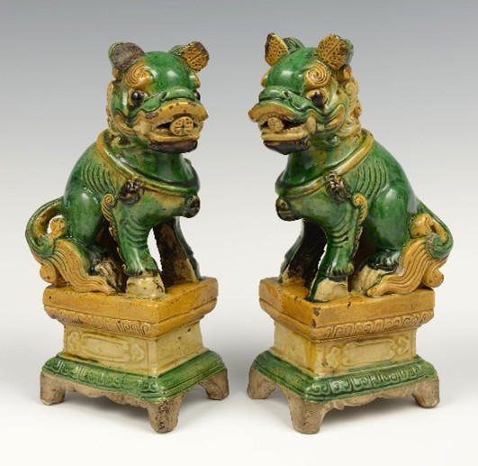 Two lion shaped candleholders